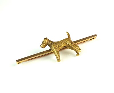 Lot 74 - A yellow metal Terrier bar brooch