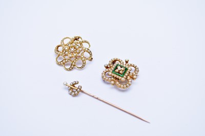 Lot 152 - Two early 20th century brooch/pendants and a stick pin