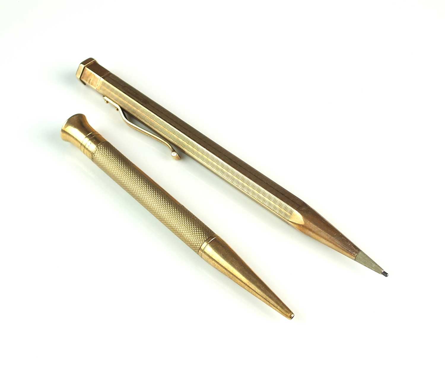 Lot 17 - Two 9ct gold retractable pencils