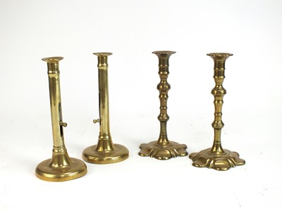 Lot 521 - Two pairs of brass candlesticks, 19th century