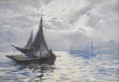 Lot 285 - Frank W Scarborough (1860-1939). Sailing Boats off a Shore