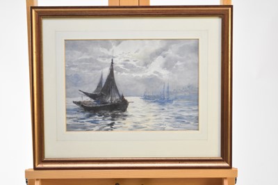 Lot 285 - Frank W Scarborough (1860-1939). Sailing Boats off a Shore