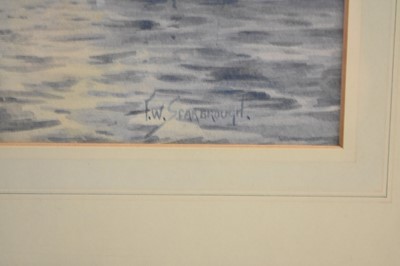 Lot 285 - Frank W Scarborough (1860-1939). Sailing Boats off a Shore