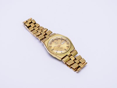 Lot 227 - Tissot: A gentleman's gold plated PR516 GL bracelet wristwatch