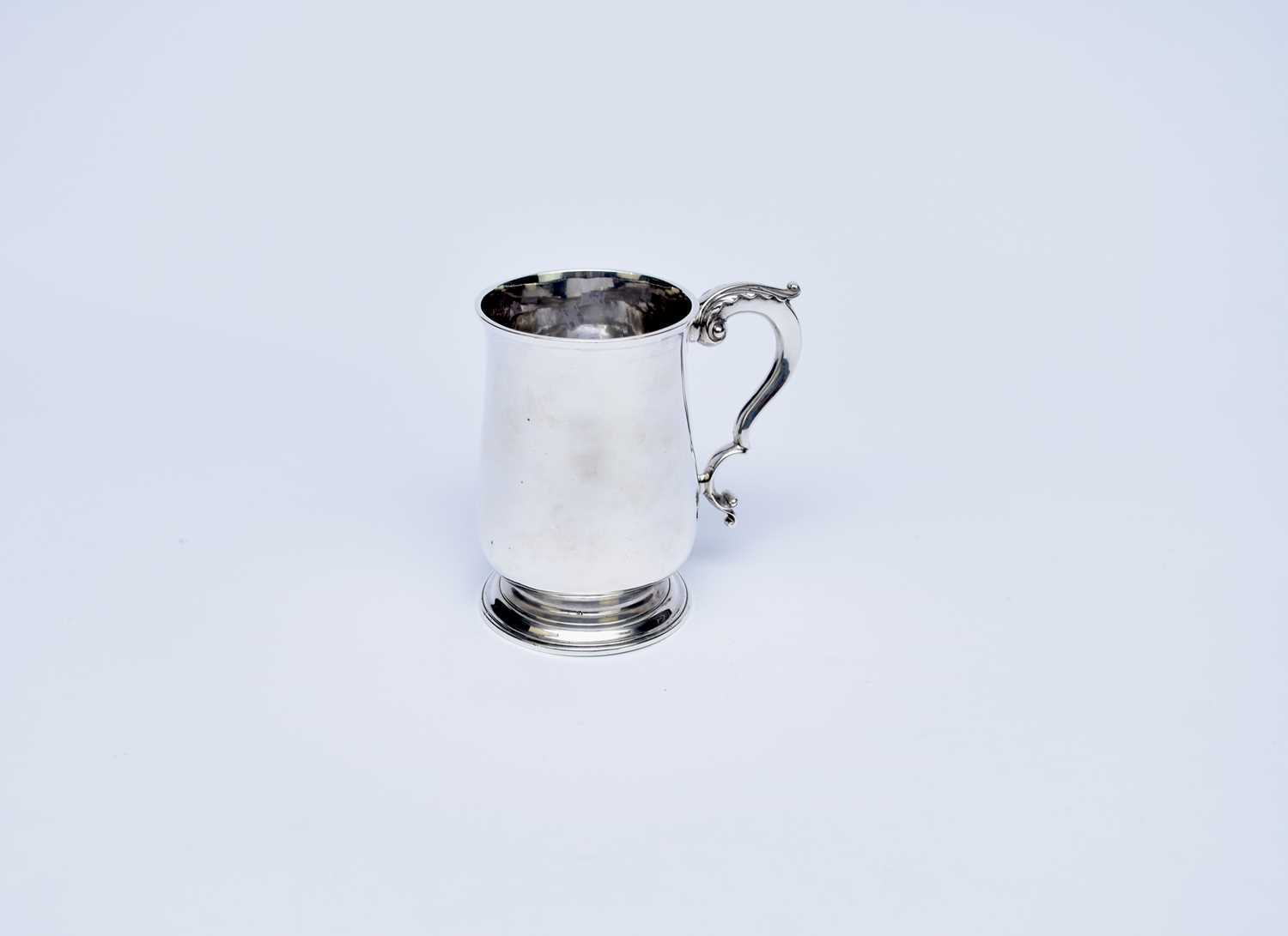 Lot 63 - A George III silver baluster mug