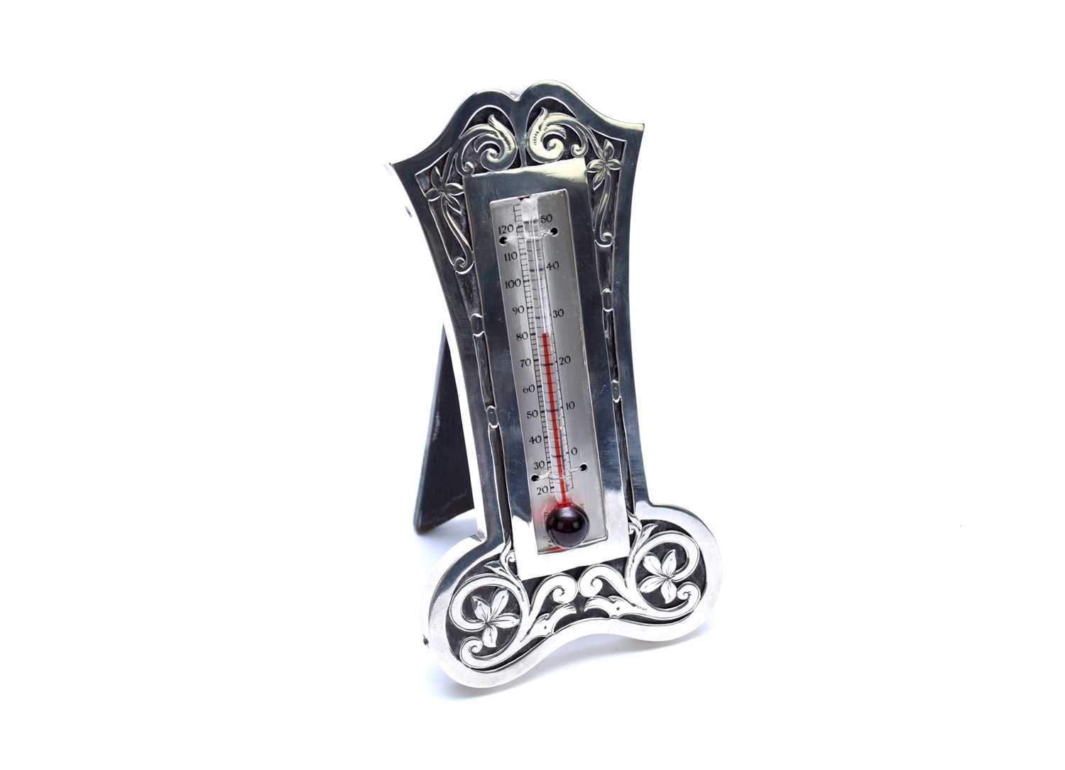 Lot 84 - An Edwardian silver mounted thermometer