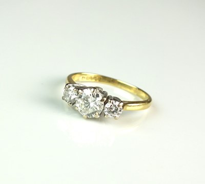 Lot 95 - An 18ct gold three stone graduated diamond ring