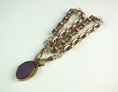 Lot 100 - A yellow metal decorative link chain with swivel fob