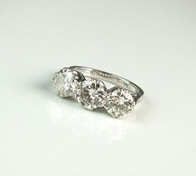 102 - A three stone diamond ring