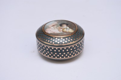 Lot 308 - A late 18th century French circular snuff box, with an inset painted panel