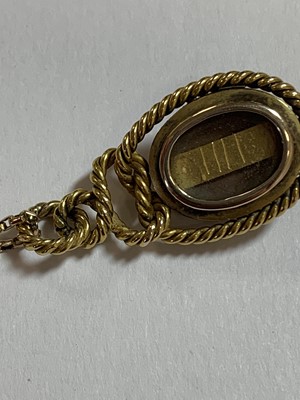 Lot 92 - A Victorian cabochon garnet locket pendant