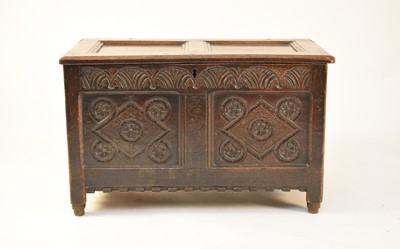 Lot 663 - A 17th century oak twin panelled coffer