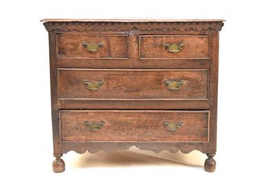 Lot 664 - A small 18th century oak chest of drawers