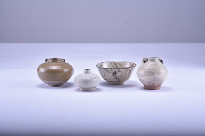 Lot 377 - Three Chinese celadon jarlets and a small bowl, Yuan Dynasty