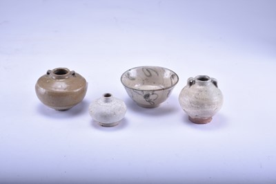 Lot 377 - Three Chinese celadon jarlets and a small bowl, Yuan Dynasty