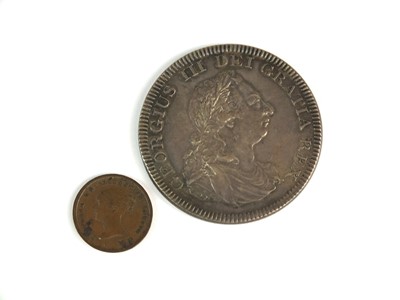 Lot 177 - A George III silver dollar and a Victorian copper half farthing