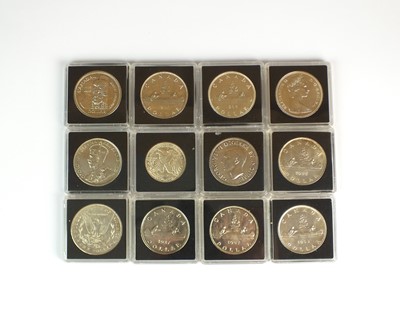 Lot 143 - A collection of twenty-four silver Canadian dollars