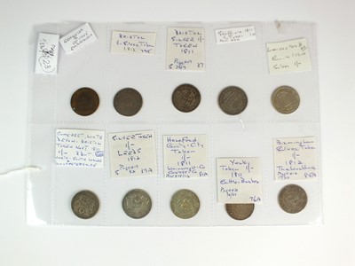 Lot 209 - A collection of nine early 19th century silver shilling trade tokens