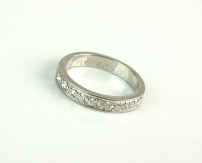 Lot 119 - A diamond half eternity ring