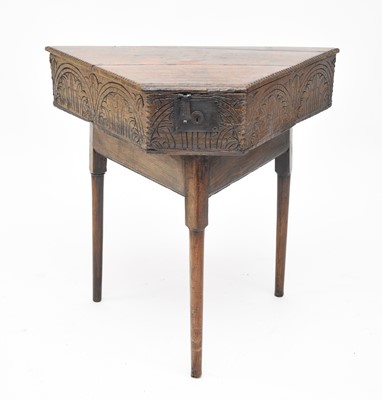 Lot 636 - A 17th century and later oak tricorn hat box on stand