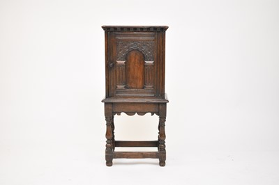 Lot 637 - A 17th century and later oak food cupboard on stand