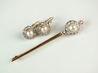 Lot 122 - A pair of cultured pearl and diamond earrings with matching brooch