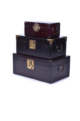 Lot 115 - A group of three South East Asian lacquered softwood travel chests
