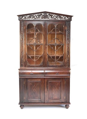 Lot 567 - An 18th century style Dutch-colonial hard-wood bookcase cabinet