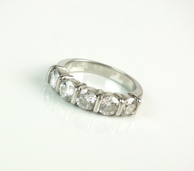 Lot 115 - A platinum five stone diamond ring