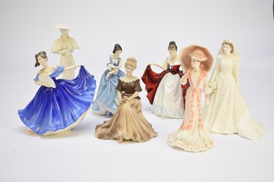 Lot 457 - Coalport and Royal Doulton ladies, including Queen Elizabeth II on her wedding day