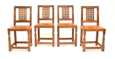 Lot 659 - A set of four Old Mill, Thirsk, oak lattice-back dining chairs