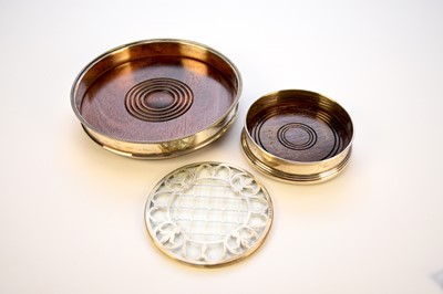 Lot 56 - Three silver mounted coasters