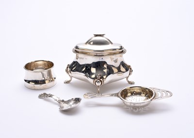 Lot 59 - A silver tea caddy, caddy spoon and tea strainer on stand