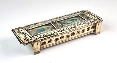 Lot 312 - An early 19th century carved bone POW dominoes box