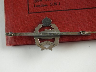 Lot A group of WWII medals, titles, badges, paperwork & two WWI photographs