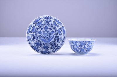 Lot 21 - A Chinese blue and white bowl and stand from the Vung Tau cargo, Kangxi