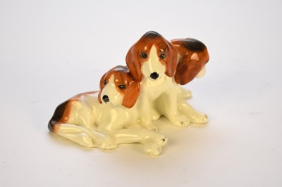 Lot 18 - Royal Worcester Doris Lindner group of three foxhound puppies