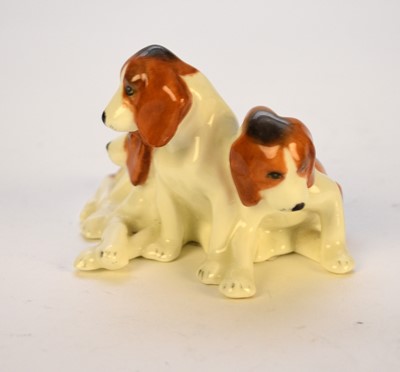 Lot 18 - Royal Worcester Doris Lindner group of three foxhound puppies