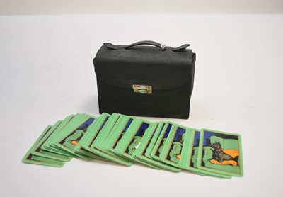 Lot 38 - Cecil Aldin interest:- a Morocco-type leather cased bezique set, with 6 sets of 'Cecil Aldin' cards