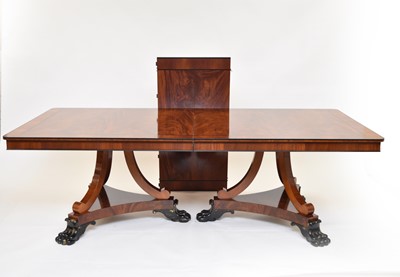 Lot 748 - A Clive Christian flame mahogany twin-pedestal extending dining table