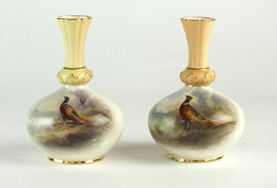 Lot 260 - A near pair of Royal Worcester vases painted by James Stinton with pheasants