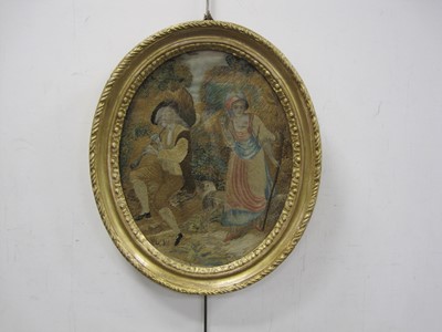 Lot 303 - A Georgian Oval embroidered picture depicting figures at Harvest- time, 29.5 x 23.1 cm