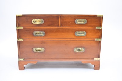 Lot 716 - A reproduction campaign chest of drawers