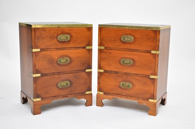 Lot 717 - A pair of reproduction campaign bedside cabinets