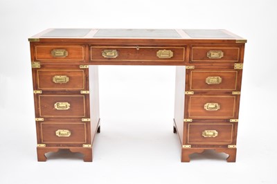 Lot 718 - A reproduction campaign style pedestal desk