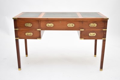 Lot 719 - A reproduction campaign style kneehole desk