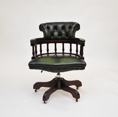 Lot 720 - A reproduction leather 'captains' type office chair