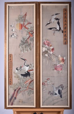 Lot 77 - A pair of Chinese embroidered silk panels