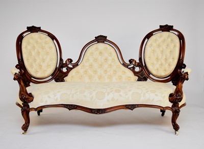 Lot 563 - A Victorian walnut, three-seater settee