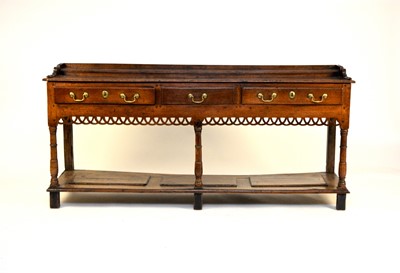 Lot 329 - A George III oak dresser base, South Wales